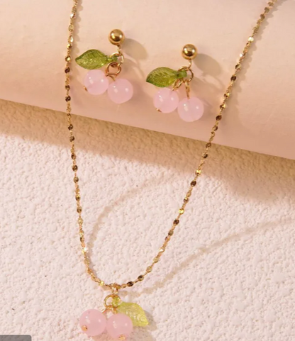 https://paygoodecu.com/products/collar-de-cerezas-rosa?_pos=1&_psq=COLLA&_ss=e&_v=1.0