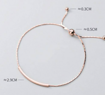 BRAZALETE AJUSTABLE DE TUBO CON CUENTAS DORADO