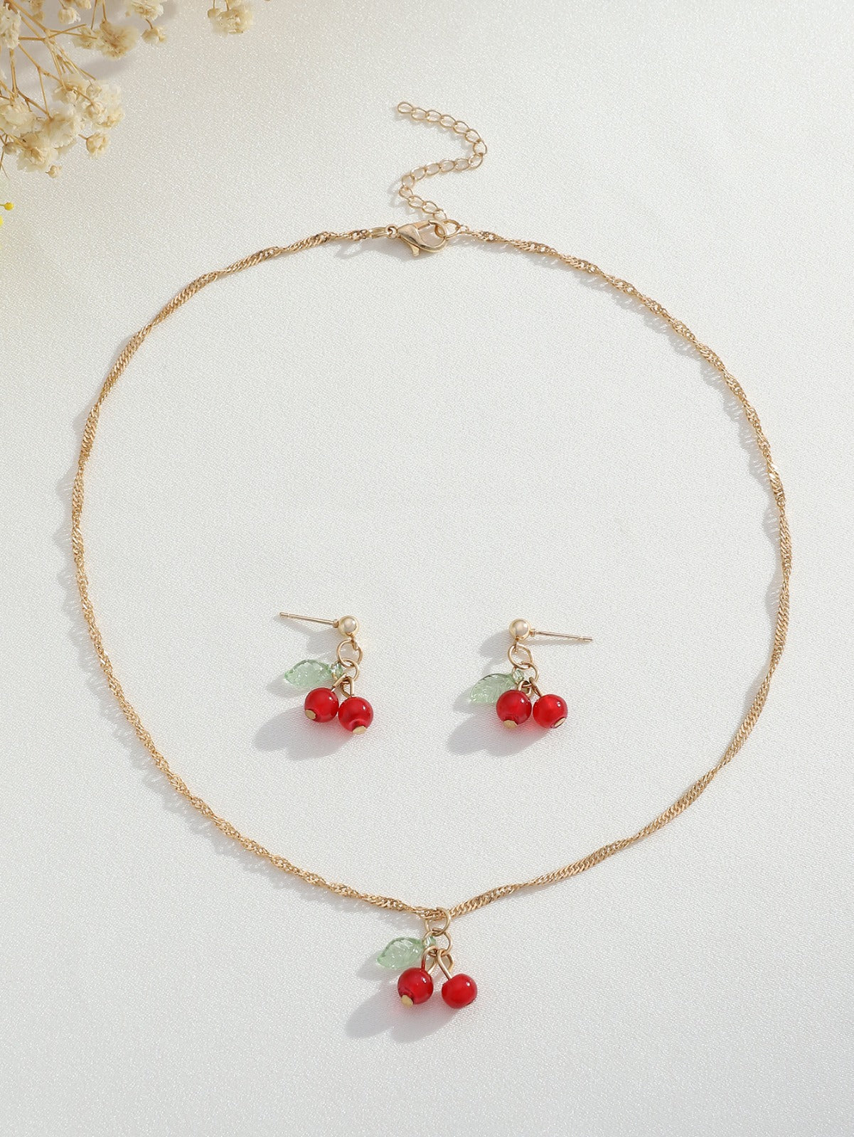 https://paygoodecu.com/products/collar-de-cerezas-rojas